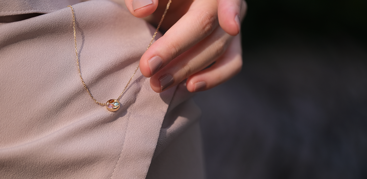 18K gold Five Elements necklace with three gemstone spiral pendant